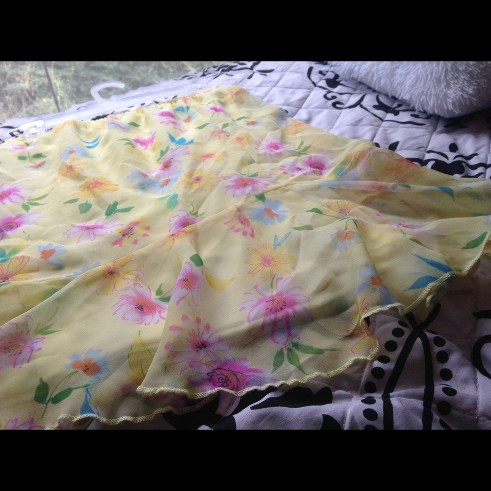 Cute girls yellow skirt with flowers